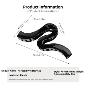 Detailed size specifications for the large wavy black shark hair claw clip in 13cm
