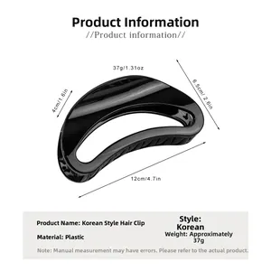 Detail view of a large black crescent hair claw with 12cm dimensions and sizing specs