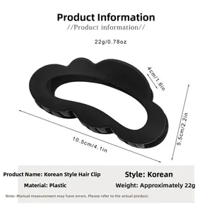 Matte black cloud-shaped hair claw clip detail with 10.5cm dimensions and size specifications