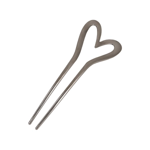 Elegant U-shaped silver metal hair fork with minimalist heart design for updo styling