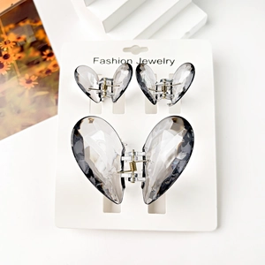 Three-piece set of transparent grey butterfly hair claws in large and small sizes