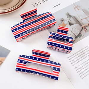 Three-piece acrylic hair claw set featuring US flag stars and stripes pattern design