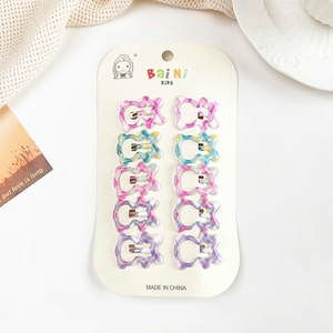 Détail de 10 barrettes à cheveux colorées à motif écossais sur carte de présentation