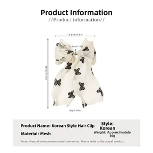 Detailed size specifications of the white mesh bow hair clip with black butterfly print