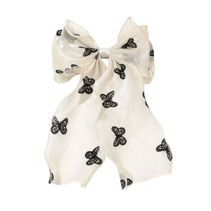 Elegant off-white organza hair clip with butterfly embroidery and long ribbon streamers