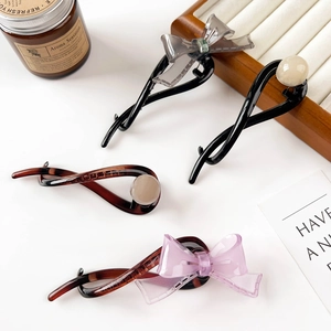 Set di fermagli a banana minimalisti con fiocchi eleganti e perle in nero e marrone ambra