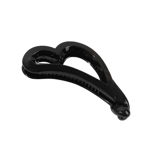 Glossy black heart-shaped banana hair clip for secure high ponytail styling