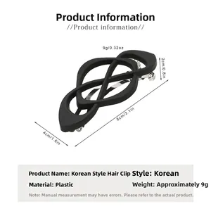 Vue détaillée de la pince à cheveux noire mate avec dimensions de 8 cm et design spécifié