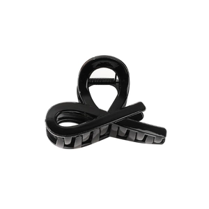 Glossy black interlaced hair claw clip with large shark clip design for thick hair