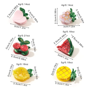 Cute fruit-shaped acetate hair claws including peach, cherry, and lemon for girls