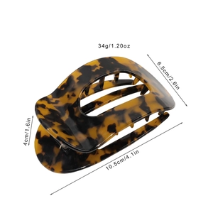 Large tortoiseshell acetate hair claw clip with semi-circular design for thick hair styling