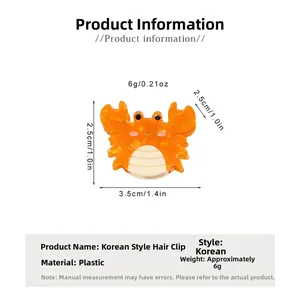 Vue détaillée de la pince à cheveux crabe orange avec les dimensions exactes