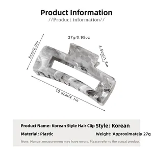 Detailed view of grey marble pattern hair claw clip with specific dimensions and weight