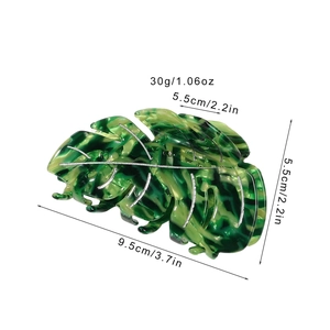 Pince à cheveux feuille verte marbrée avec nervures argentées, longueur de 9.5 cm