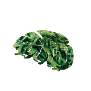 Pince à cheveux feuille de monstera en acétate marbré vert avec nervures argentées
