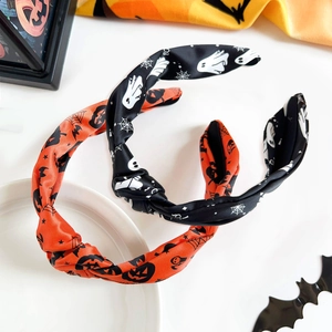 Halloween knot headbands with festive pumpkin, ghost, and spider web prints for women