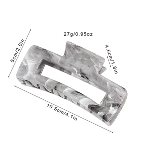 Large marble textured hair claw clip in grey and white rectangle design with measurements