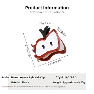 Detail view of cartoon apple hair claw showing 6.5cm dimensions and 23g lightweight plastic