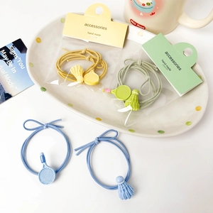 Cute badminton racket and birdie elastic hair ties in yellow green and blue colors
