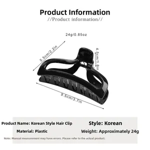 Detailed view of black hair claw clip with 9.5cm dimensions and lightweight plastic design