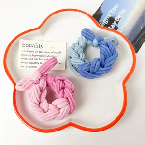 Thick braided twist hair ties in pink and blue contrast colors for high-elasticity styling