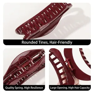 Minimalist deep red hair claw clip with large opening and glossy resin finish