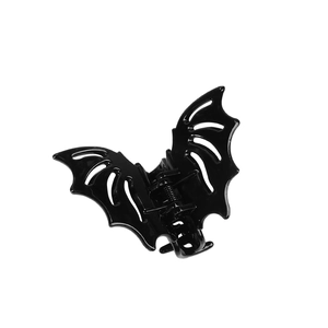 Polished black ABS bat hair claw clip for Halloween gothic styling on white background