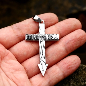Detail of vintage stainless steel cross arrow pendant with Going To Hell engraving