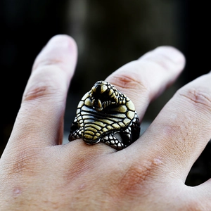Detailed macro shot of vintage cobra snake head ring with realistic scale texture