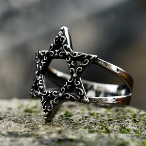 Vintage stainless steel Star of David ring with intricate floral engraving on mossy stone
