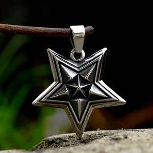 Vintage stainless steel pentagram pendant with 3D layered design on rustic background