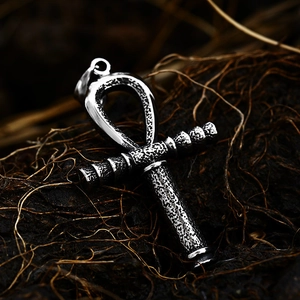 Vintage stainless steel Ankh cross pendant necklace with hammered texture in nature