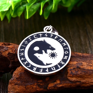 Viking compass pendant with Yin Yang wolf head and Nordic runes on natural wood base
