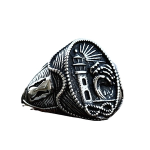Vintage stainless steel lighthouse ring with nautical waves and retro punk shield design