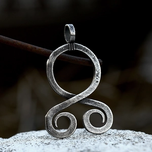 Vintage stainless steel octopus pendant with rustic Celtic style and hammered metal finish