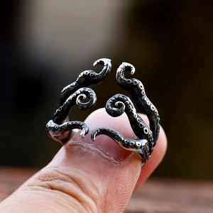 Macro detail of gothic octopus tentacle ring with vintage black oxidation finish