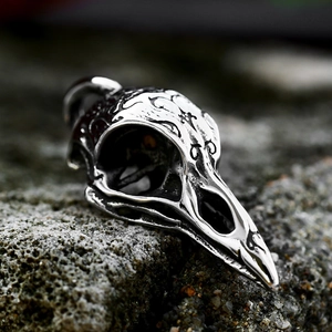 Gothic viking crow skull pendant in vintage stainless steel with engraved floral patterns