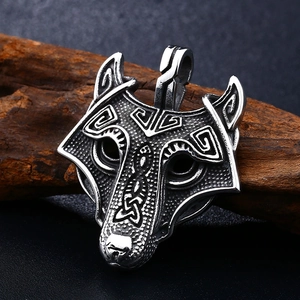Vintage stainless steel wolf head pendant with Nordic Celtic knots on a wood branch