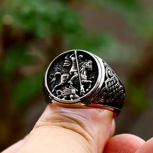 Macro shot of Viking stainless steel signet ring with Saint George and Dragon relief