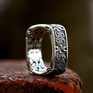 Men's square stainless steel ring with vintage Celtic knot pattern on a stone base