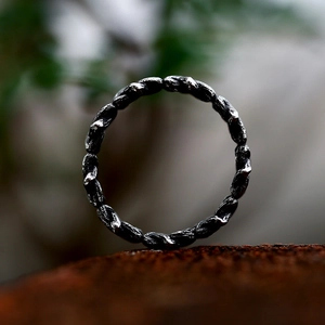 Vintage oxidized stainless steel star ring with antique silver finish and twisted texture