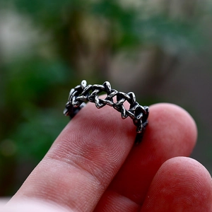 Vintage gothic stainless steel star ring with oxidized finish and twisted hollow design