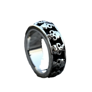 Vintage punk style stainless steel skull ring with embossed gothic texture design