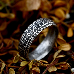 Vintage Viking rune ring in retro steel finish with wheat pattern and Nordic symbols