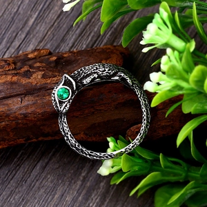 Vintage stainless steel lizard snake ring with green zircon eye and textured scale detail