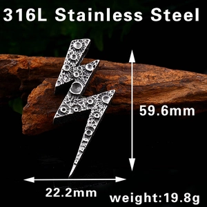 Detail view of lightning bolt pendant in 316L stainless steel with hammered texture