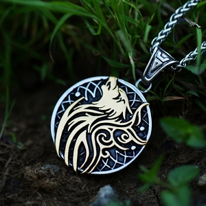 Viking wolf head pendant necklace in silver and gold steel finish on earth background