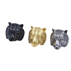 Men's titanium steel tiger head rings in black, gold, and silver finishes with 3D relief