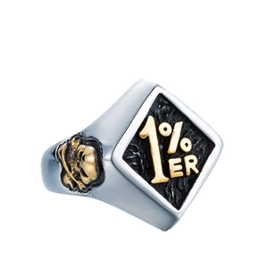 Vintage stainless steel biker ring featuring a black 1% ER sign and golden skull relief