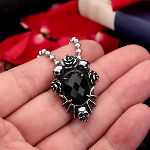 Gothic stainless steel skull and black gemstone pendant necklace with rose and bat wing detail